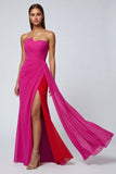 Abito elegante lungo in tulle senza spalline in Fucsia con fascia
