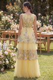 Abito floreale lungo a livelli ricamato a V in tulle giallo