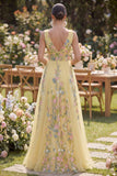 Abito Maxi ricamato a fiori a scollo a V in giallo pastello