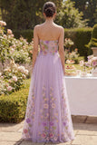 Abito floreale lungo ricamato in tulle lilla senza spalline