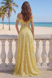 Corsetto giallo in pizzo con spalle a fila a A e applicate con un lungo abito da cerimonia