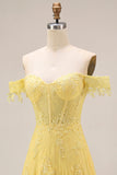 Corsetto giallo in pizzo con spalle a fila a A e applicate con un lungo abito da cerimonia