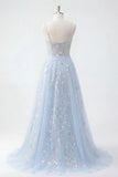 Corsetto blu a paillettes con applichi e abito lungo da cerimonia