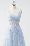 Corsetto blu a paillettes con applichi e abito lungo da cerimonia
