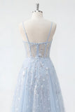 Corsetto blu a paillettes con applichi e abito lungo da cerimonia