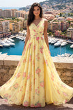 Abito da cerimonia a fiori giallo con scollo a V e fessura