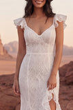 Abito da sposa Boho con volant in merletto avorio e spacco