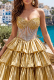 Corsetto trasparente senza spalline dorato a linea, vestito di homecoming a livelli con perline