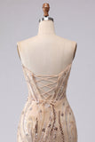 Abito di cocktail con paillettes color champagne senza spalline con pizzo sulla schiena