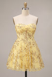 Abito giallo di Homecoming con paillettes senza spalline tagliato a linea a A