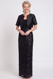 Abito lungo con paillettes nere scintillanti con fessura