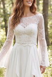 Abito da sposa a maniche lunghe con volant in chiffon avorio e fessura