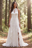 Abito da sposa a linea lunga in pizzo avorio con fessura