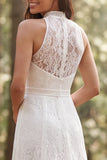 Abito da sposa a linea lunga in pizzo avorio con fessura