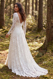 Abito da sposa a maniche lunghe in pizzo avorio con fessura