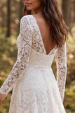 Abito da sposa a maniche lunghe in pizzo avorio con fessura