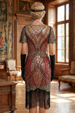 Vestito bodycon cordi rossi dorati a V con paillettes anni '20 e orlo a frangia