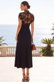 Abito midi floreale Black Illusion con collo alto e maniche corte