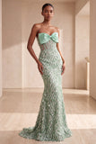 Corsetto, sirena senza spalline piumate con paillettes, vestito lungo elegante con fiocco