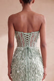 Corsetto, sirena senza spalline piumate con paillettes, vestito lungo elegante con fiocco