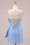 Abito corto di cocktail senza spalline blu reale con fiocco oversize frontale