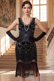 Abito Flapper degli anni '20 con scollo scollato in forma di paillettes nere dorate scintillanti
