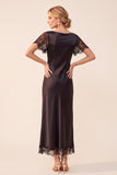 Abito da invitate da sposa midi con scollo battiere nero a maniche corte e pizzo
