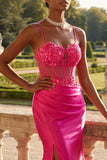 Vestito da cerimonia lungo floreale fucsia con corsetto sirena a perline