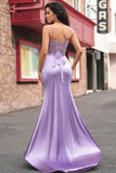 Corsetto floreale viola con abito da cerimonia lungo da sirena