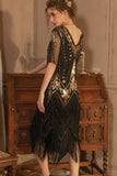 Sparkly nero dorato maniche corte scollo a V paillettes 1920s Gatsby Dress con frange