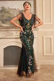 Guaina dorata verde con scollo a V paillettes lungo 1920s Flapper Dress con frange