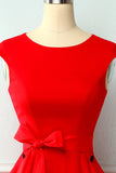 Vestito scampanato anni '50 con bottone rosso