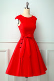 Vestito scampanato anni '50 con bottone rosso