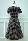 Abito vintage plaid anni '50 con fiocco