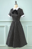 Abito vintage plaid anni '50 con fiocco