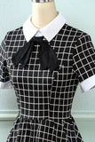 Abito vintage plaid anni '50 con fiocco