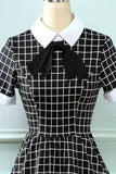 Abito vintage plaid anni '50 con fiocco