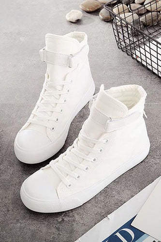 Sneakers in tela alta con fibbia bianca