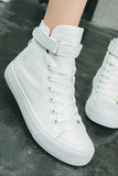 Sneakers in tela alta con fibbia bianca