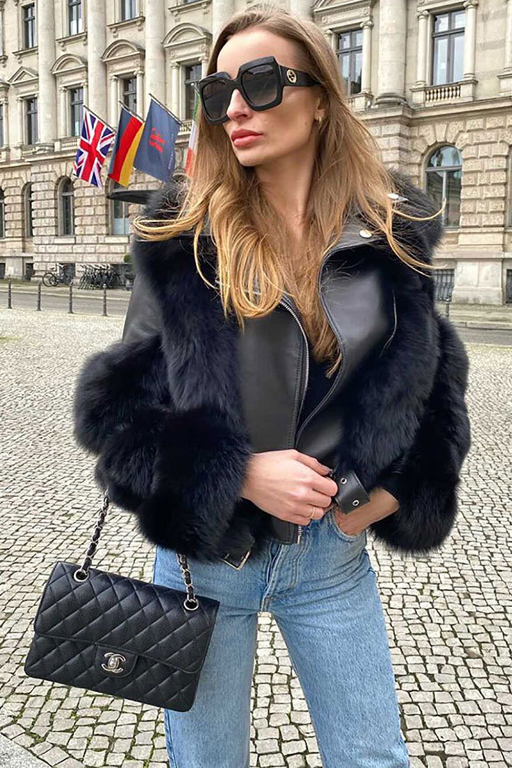 Giacca in pelliccia sintetica in pelle con cerniera tagliata nera