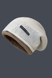 Cappello patchwork lavorato a maglia grigio