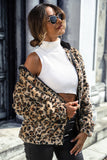 Cappotto grigio leopardato con cappuccio e zip