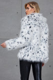 Cappotto da donna in pelliccia sintetica con stampa leopardata bianca con stampa a revers