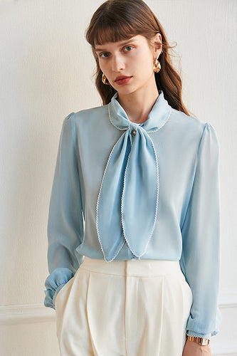 Camicetta da donna in seta blu cielo con fiocco