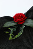 Cappello nero in stile anni '20 con fiore