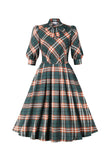 Abito a quadri verde scuro del 1950