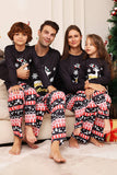 Set di pigiami coordinati per la famiglia di cervi neri e fiocchi di neve di Natale