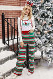 Tute in maglia con fiocco di neve rosso di Natale