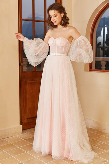 Abito da sposa a pois rosa con maniche a sbuffo
