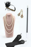 Abito flapper anni '20 con paillettes nere scintillanti con accessori anni '20